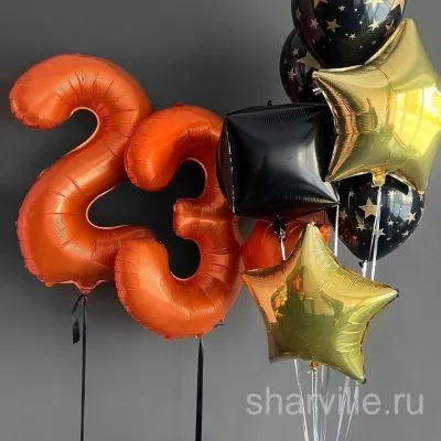 Композиция к 23 февраля: красные цифры 23, золотые звёзды и чёрный куб